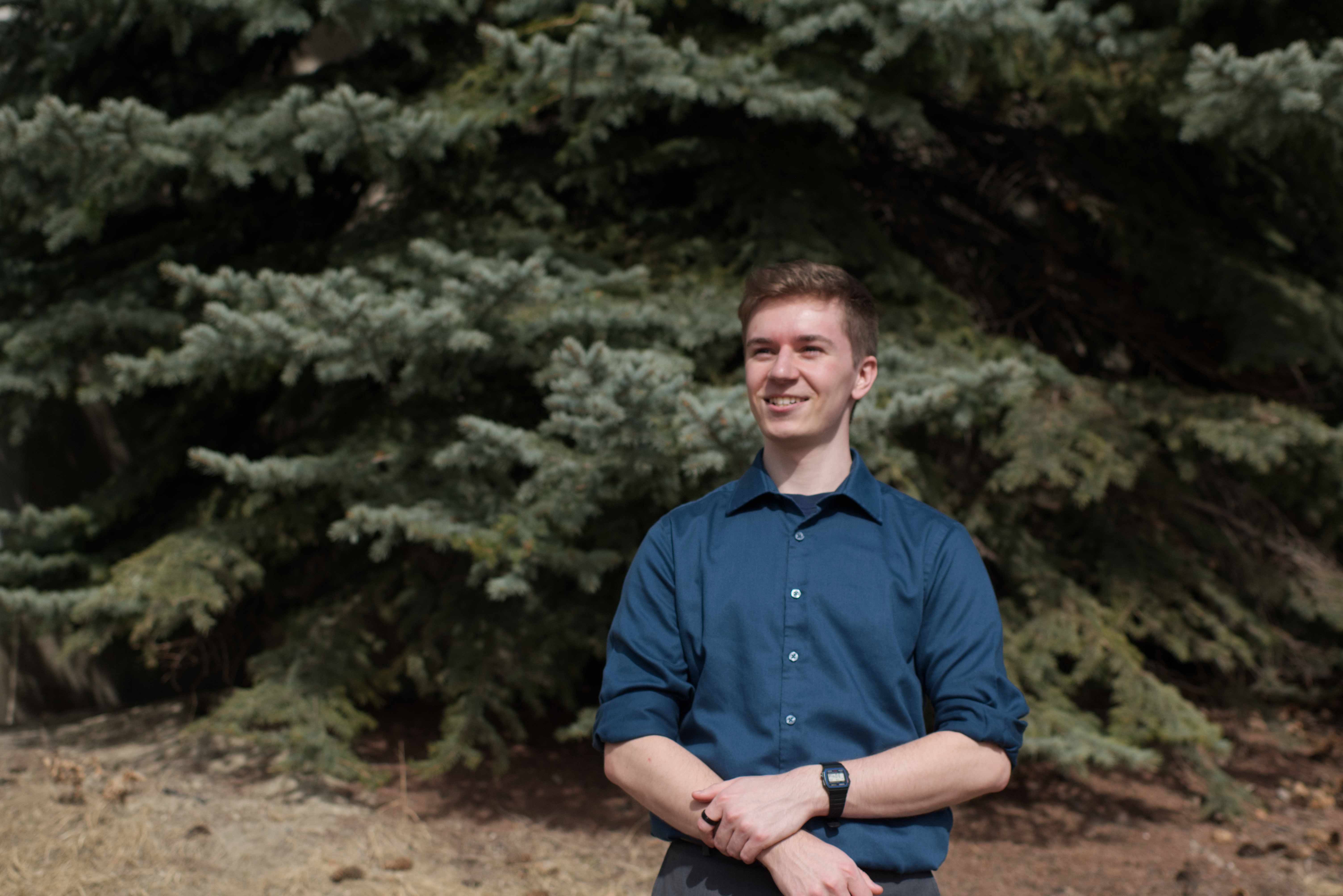 Thomas Rynsburger in front of trees